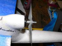 Name: P1010027.jpg
Views: 2344
Size: 63.7 KB
Description: Here is the prop bolted on.  The convex part of the blades and prop lettering "6x4" is facing the direction of flight.  The prop should spin clockwise when looking from the rear of the plane.