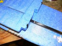 Name: P1030681.jpg
Views: 1510
Size: 116.2 KB
Description: Here is the 13" marker that let's me know then the rod is in the wing correctly.  The other mark is the all important Center of gravity (COG) balance point.  That mark is on both wings.