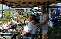 Name: DSC_0397.jpg
Views: 48
Size: 299.4 KB
Description: Steve Staples was running his sunblock salon to help keep everyone from getting toasted and here he gives Tom Blakeney a touch up.