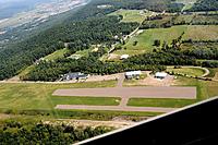 Name: DSC_0147 ES.jpg
Views: 26
Size: 290.4 KB
Description: A view of the airport on top of Harris Hill from my sailplane ride.