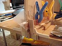 Name: DSC01395.jpg
Views: 118
Size: 37.3 KB
Description: Jig to hold planks at the bow frame while epoxy sets