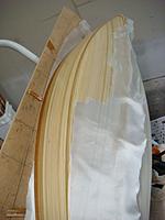 Name: DSC01747.jpg
Views: 128
Size: 45.0 KB
Description: Beginning wetting down the glass cloth. I use a 3" foam roller and a brush for tight areas.