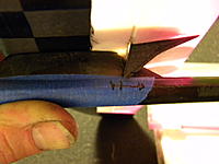 Name: Helios build 2 334.jpg
Views: 163
Size: 122.2 KB
Description: Now we also need a hole for the string exit, place some tape to draw on and set the surface on the fuse to mark the horn's range of motion