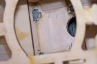 Name: Kyosho P40-50 series build mods 042.jpg
Views: 122
Size: 45.8 KB
Description: Back of the firewall very well sanded to accept a coat of thinned epoxy.