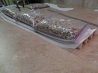 Name: cub 010.jpg
Views: 186
Size: 148.6 KB
Description: Use bags of stone or pop cans to hold wing halves down while glue is drying.