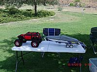 Name: CIMG1151.jpg
Views: 19
Size: 152.5 KB
Description: My Summit and trailer with boat under cover.