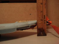 Name: DSC04801.jpg
Views: 1265
Size: 43.1 KB
Description: Bow amount added to the front of the board.
We have found that the less bow you have the better he will turn. In other words if hes not turning, you need to take some of this out.