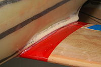 Name: Mini-Macchi_339.jpg
Views: 47
Size: 105.1 KB
Description: Press the fuse down onto the wing, keeping it all aligned with the marks you drew. Carefully wipe off any excess glue that squeezes out.