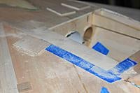 Name: 002a.jpg
Views: 63
Size: 125.8 KB
Description: Making the hatch area and sanding it even with the wing.