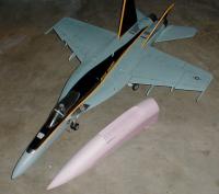 Name: foamie5.jpg
Views: 176
Size: 72.7 KB
Description: The nose section next to the Super Hornet.