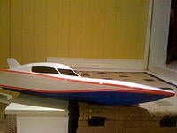 Name: Wing1.jpg
Views: 28
Size: 250.3 KB
Description: How it came stock........twin 380 brushed drive with "vector" steering