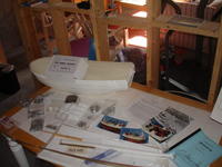 Name: DSC03443.jpg
Views: 266
Size: 58.5 KB
Description: Box contents.  Including 3 pics of a finished model, styrene sheets, metal fittings, rods and miscellaneous stuff.