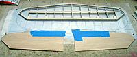 Name: IMGP3296.jpg
Views: 296
Size: 77.8 KB
Description: Hinge point holes pre-drilled, and sheeting glued together prior to applying to the structure.