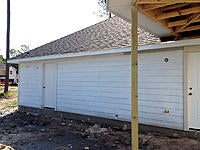 Name: img_06.jpg
Views: 114
Size: 150.7 KB
Description: Back entrance for workshop.  Note shower and spigot location.