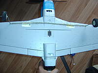 Name: P51 CG (1).jpg
Views: 103
Size: 63.2 KB
Description: coat hanger wire installed with hot glue. I had to dig a trench to deepen it to fit.