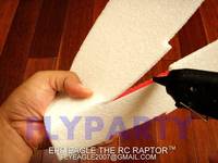 Name: PA062395.jpg
Views: 1344
Size: 90.1 KB
Description: Step 9: With one hand securely hold the glued area of the eagle beak to the bottom, apply glue to the side of the bottom fuselage of
the eagle head area as shown.