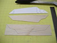 Name: DSCF2421.jpg Views: 354 Size: 61.8 KB Description: Cut out elevon pieces using template and razor knife. Use a strait edge ruler as a guide to get nice strait cuts.