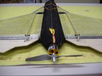 Name: DSCF2462.jpg Views: 484 Size: 86.6 KB Description: With radio on and control rods and control horns attached make sure servo arms are centered. After everything is correct hot glue servos in place. They should be flush with top of wing.