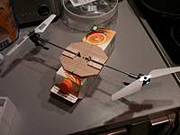 Name: IMG_0460.jpg
Views: 663
Size: 94.1 KB
Description: For me to get an idea of the size. The bottle weights 32g and the motors can lift it. The fuselage will have to be lighter than that :)