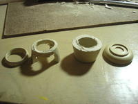 Name: P7281265.jpg
Views: 136
Size: 71.9 KB
Description: the progression of the destruction, started off cutting a small ring then making it into Swiss cheese, then the huge chop into the final product, a nice light, cap  
