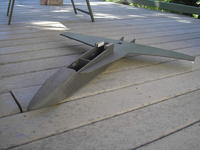 Name: P8261355.jpg
Views: 169
Size: 70.9 KB
Description: Notice the sanded nosecone! This and the canopy are made of ten 6mm pieces of the same outline, the sanding takes quite some time!