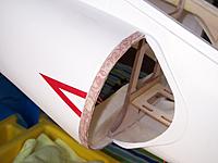 Name: 100_2151.jpg
Views: 155
Size: 109.6 KB
Description: Again, idea from X30pilot: two layers of 1/64 ply around the area the front intakes meet the fuse.  It fills the gap and also will be a good place to get screws in.