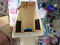 Name: 100_2154.jpg
Views: 140
Size: 193.9 KB
Description: Saw a few cracks developing in the fuse, so epoxied 2" carbon fiber tape