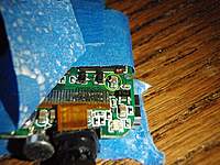 Name: P1130003.jpg
Views: 177
Size: 126.5 KB
Description: Small solder snag... was red power wire connect here once, like some cameras have?