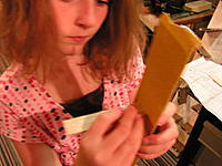 Name: 004.jpg
Views: 62
Size: 192.8 KB
Description: Sanding the Fuse longerons to strengthen the joint where the rear fuse glues to the forward fuse.