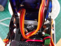 Name: DSCF0841.jpg
Views: 123
Size: 76.4 KB
Description: Close up of gear you can see some of the plastic shavings on the one servo cable if you look at the full size pic
