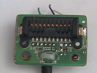 Name: DCAM0082.jpg
Views: 311
Size: 52.1 KB
Description: board cut and unnecessary components desoldered. Cable tightened with new cable clamp.