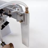 Two screws attach the rudder to the stand-off bracket. The bottom screw is brass and is designed to sheer off if the rudder strikes something, thus saving the transom.