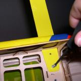 Installing landing gear half to the fuse.  I used blue locktite to insure the screws don't come loose.