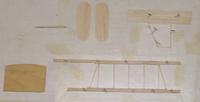 Name: ezb2.jpg
Views: 423
Size: 64.2 KB
Description: Made up tail surfaces and cut out prop blanks, using 1/16" light stock (will sand these down somewhat later)