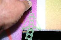 Name: IMG_6784.jpg
Views: 90
Size: 140.7 KB
Description: Using  the upper rudder hinge as a guide, make a mark so you how far into the rudder to cut the slot.