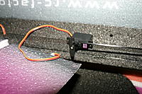Name: IMG_6793.jpg
Views: 139
Size: 213.6 KB
Description: Use the elevator control rod to find the position of the elevator servo.  It mounts on the bottom of the horizontal portion of the fuselage. I did not recess mine but you can.