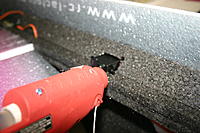 Name: IMG_6796.jpg
Views: 112
Size: 184.3 KB
Description: I cut a hole in the foam bracing for the servo topartially recess into. Use Welders of hot glue to fasten the servo. Allow the arm to hang over the edge so the rod will move freely.