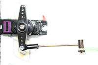 Name: IMG_6839.jpg
Views: 134
Size: 69.4 KB
Description: I used a  ball link at the servo and an EZ connecter at the horn.  This gives me mechanical adjustment. I do not like the angle of the rod but with the servo installed standing up, it is what it is. I will lay it down on the next one I build.