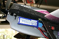 Name: IMG_6842.jpg
Views: 190
Size: 207.1 KB
Description: Using an 1800mah 155g battery this is my battery placement for CG of 105mm back from the leading edge of the wing.  I will fly it and adjust it from here, Notice I used a long piece of Velcro so I could move the battery  aft or forward or use a heavier ba