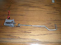 Name: P-51_Retracts_2-10-2010-0009.jpg
Views: 381
Size: 71.6 KB
Description: This is a mock-up of the pieces I made to join the stock metal strut arm to the DSR servo leg. 1/4" ID collar/3/8" brake line with 1/4"OD. Enlarged servo end of tube with #10 drill bit, 5/8" deep.