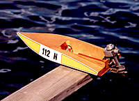 Name: BabyBrocPort.jpg
Views: 179
Size: 59.4 KB
Description: 1/8-scale model of of a C-stock runabout, based on my 1:1 boat built by Craig Bowman.  Motor is a 1950s Allyn Sea Fury .049 glow outboard.