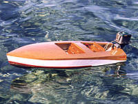 Name: MeteorIIc.jpg
Views: 150
Size: 114.6 KB
Description: This is another 1950s runabout called the Meteor.  Similar style to the Arrow.  The motor is a battery operated 1955 Mercury Mark 55 by K&O Models.