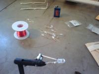 Name: SSX 039.jpg
Views: 414
Size: 63.7 KB
Description: First, there is a LOT of soldering on this project! 20 resistors to the LEDs then, 20 LEDs to the super thin "magnet wire" in just the right place!