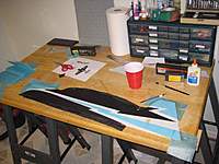 Name: IMG_3459.jpg
Views: 1528
Size: 76.0 KB
Description: Applying the tissue paper with thinned Elmer's glue. Did the entire side at once to position all the pieces. Let dry and trimmed the excess.
