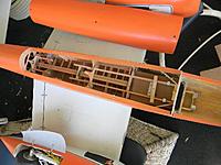 Name: 00s98.jpg
Views: 88
Size: 40.8 KB
Description: Look at the wing inside the fuselage where the two wing halves attach. This part of the wing needs more stringers and the main spar beefed up with hardwood and carbon fiber. Before I start on that I will inspect the inside of the rest of the wing with lig