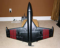 Name: FunJet_04.jpg
Views: 181
Size: 118.8 KB
Description: I used electrical tape to cover the servo wires and to hold down the servo covers.