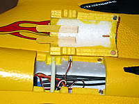 Name: FunJet_06.jpg
Views: 158
Size: 94.5 KB
Description: I used a popsicle stick, cut in half, for the front and a couple of magnets in the back to secure it.  The fit is good and snug.  Even without the magnets, I'm not sure it would go anywhere.  I would have used a hatch latch but my LHS doesn't carry them.