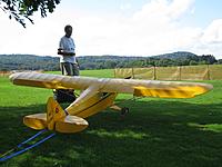 Name: image.jpg
Views: 48
Size: 220.1 KB
Description: My flying buddy's J3. I hope to post a video of it one of these days. And yes - there is a scale trim crank!