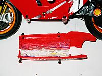 Name: IMG_2774.jpg
Views: 120
Size: 194.1 KB
Description: Modded battery box & alloy brackets for mounting.