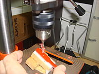 Name: DSC01430.jpg
Views: 48
Size: 155.4 KB
Description: Preparing an angled hole for introducing and fixing antennas.